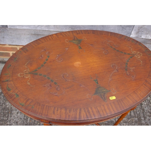 550 - A Sheraton Revival painted satinwood oval centre table, on turned supports united by an 'X' stretche... 