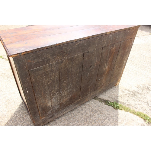 556 - A 19th century French carved fruitwood sideboard, fitted two drawers over cupboards, enclosed panel ... 