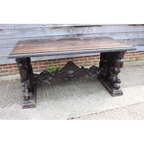 557 - A mid Victorian carved walnut centre table of 17th century design, figure and scroll panel end suppo... 