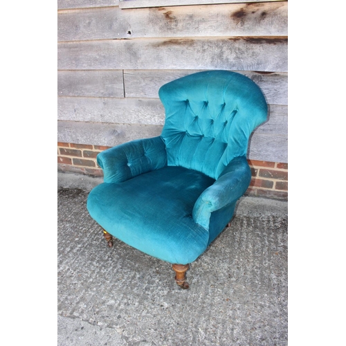 577 - A late 19th tub-shape occasional chair, button upholstered in a turquoise velour, on turned supports