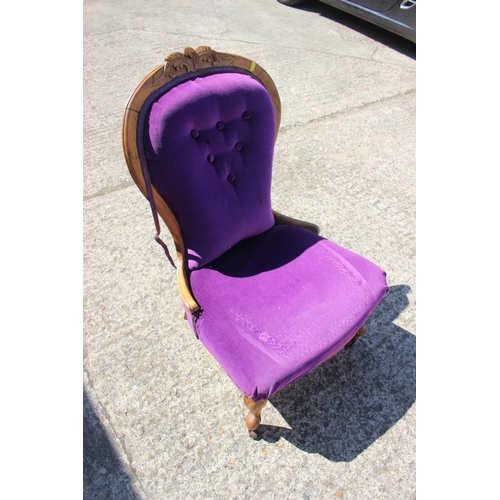 580 - A late 19th century polished as walnut showframe low seat nursing chair, on cabriole supports