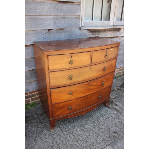 585 - A late 19th century mahogany bowfront chest of two short and three long graduated drawers with brass... 