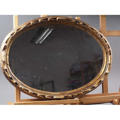 596 - A 19th century oval gilt framed wall mirror, and another gilt framed oval wall mirror