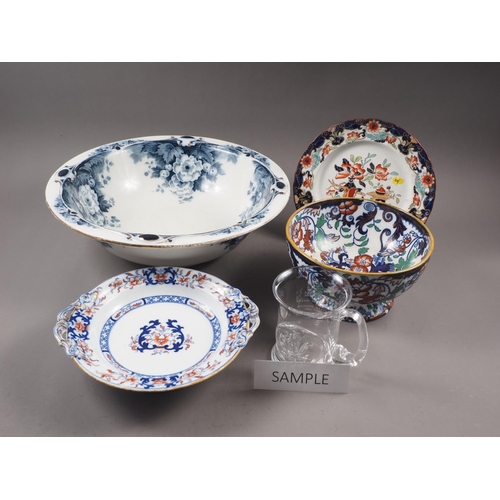 69 - An Ironstone fruit bowl, a similar cake stand, four similar plates, a wash basin and three pieces of... 