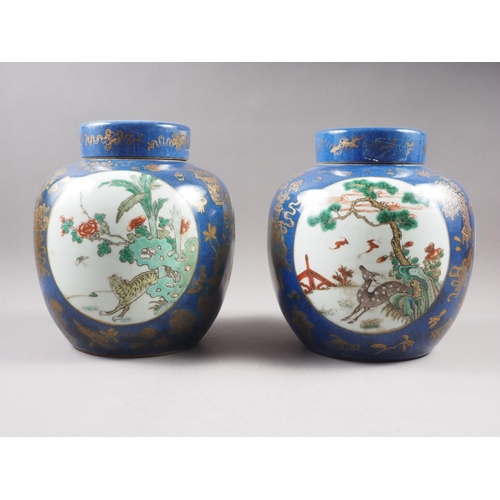 92 - A pair of Chinese ginger jars and covers, decorated three panels with animals and gilt precious obje... 