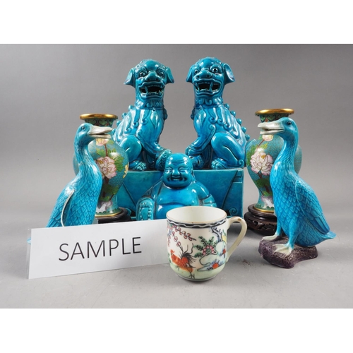 95 - A pair of Chinese turquoise glazed model Dogs of Fo, 10 1/4