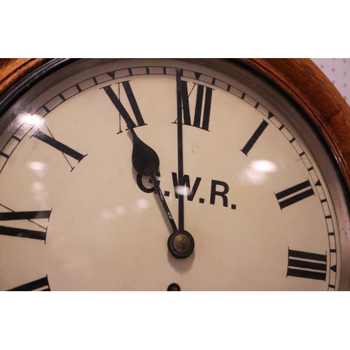 132 - A GWR single fusee wall clock, in oak case (formerly at Reading Station) with LMS brass plate, 16