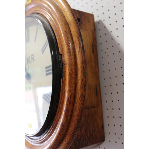 132 - A GWR single fusee wall clock, in oak case (formerly at Reading Station) with LMS brass plate, 16