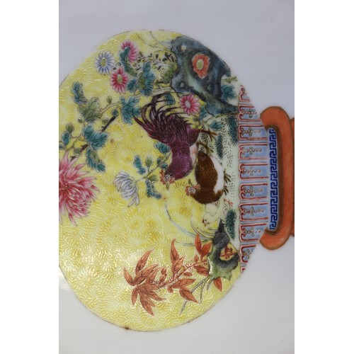 91 - A Chinese porcelain plaque with vase and flower decoration, seal marks, 9 3/4