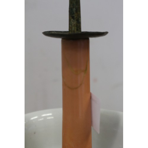 89 - A Chinese peach glazed pricket candlestick with gilt dragon and wave decoration, 11 1/2