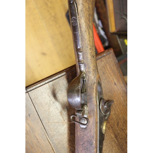 195 - A percussion cap musket with hardwood stock, barrel 58