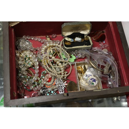 404 - A quantity of costume jewellery, including brooches, two pins, shirt studs, various white metal and ... 