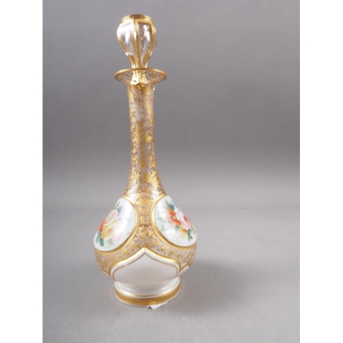 14 - A 19th century Austrian enamelled, gilt and overlaid scent bottle with floral panels, portrait and s... 