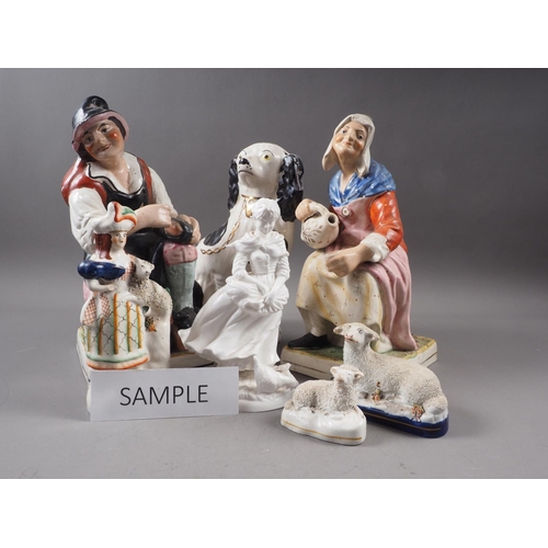 29 - A pair of Staffordshire figures, 