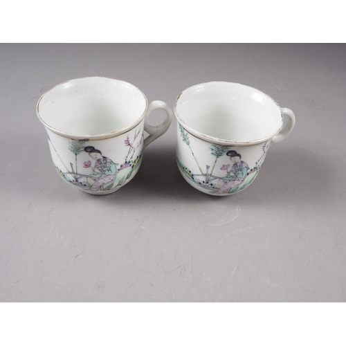 33 - A pair of 20th century Chinese porcelain cups with figure decoration and verses, 23 1/4