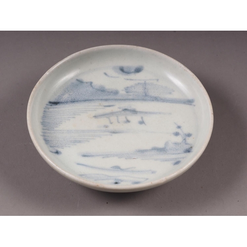 55 - A Chinese blue and white saucer dish, decorated riverscape, from the Vung Tau cargo, 4 3/4