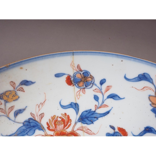 59 - An Imari shallow dish (cracks), 1