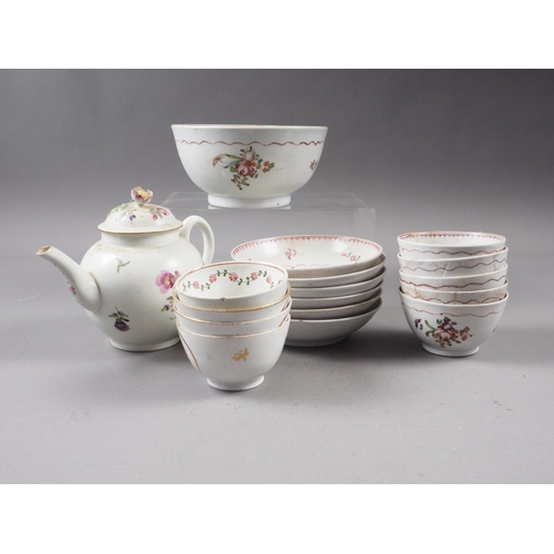 7 - An 18th century Worcester teapot with floral spray decoration, similar tea bowls, saucers and a suga... 