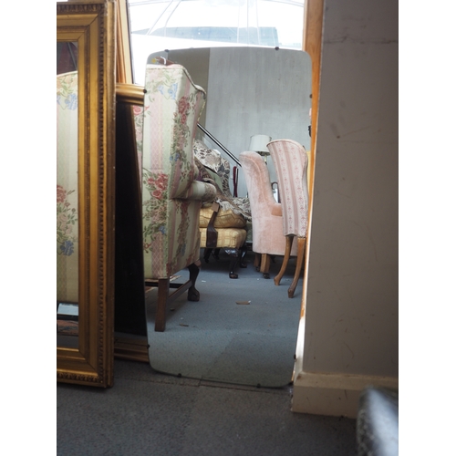 123 - Two 1920s style unframed wall mirrors