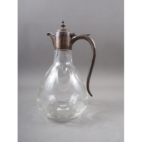 151 - An Edwardian silver mounted and blown glass claret jug, 9 1/2