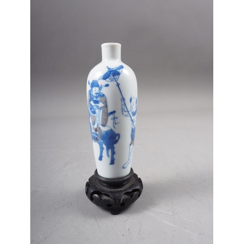 42 - A Chinese blue and white porcelain miniature vase, decorated figure on horseback, four-character mar... 