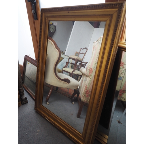 431 - A gilt framed wall mirror with egg and dart decoration, plate 34