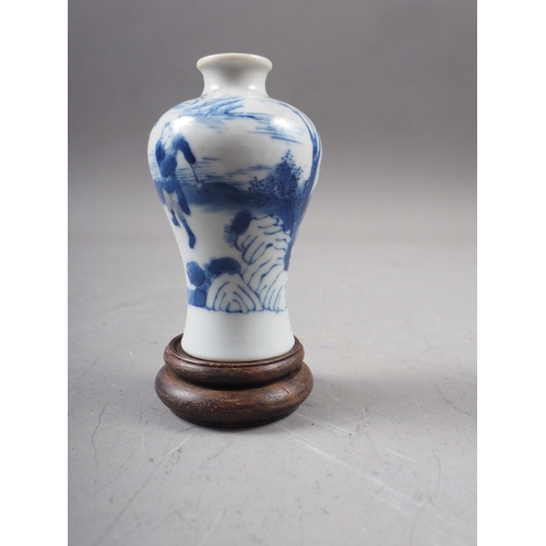 51 - A Chinese blue and white porcelain vase, decorated farmers and warriors, four-character mark to base... 