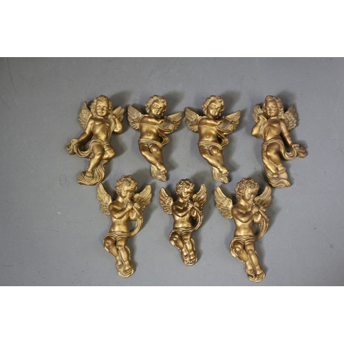 122 - Seven gilt putti, 5 1/2