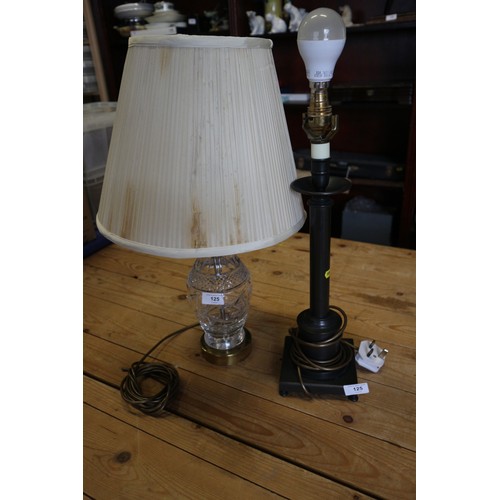 125 - A cut glass lamp base with brass mounts and a patinated metal column lamp