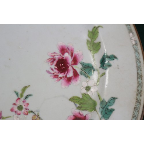 56 - A pair of Chinese plates with floral decoration, 9