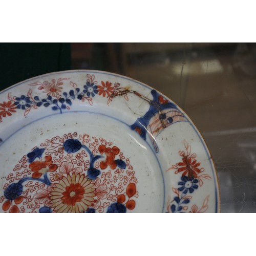 59 - An Imari shallow dish (cracks), 1