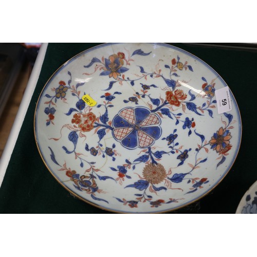 59 - An Imari shallow dish (cracks), 1