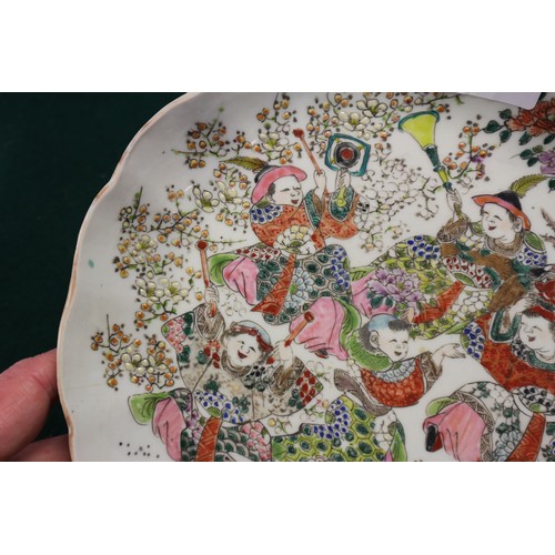 45 - A Chinese famille verte porcelain shallow dish, decorated four boats and figures, four-character mar... 