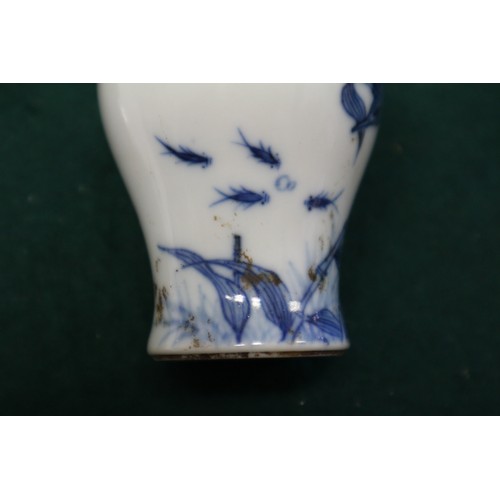 41 - A Chinese blue and white porcelain miniature vase, decorated bird and fish, six-character mark to ba... 