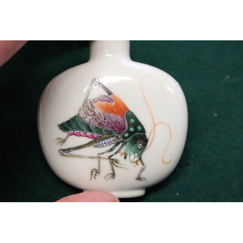 40 - A Chinese porcelain snuff bottle, decorated crickets, seal mark to base, on wooden stand, 2 1/4