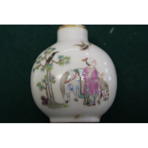 39 - A Chinese porcelain snuff bottle with figure decoration, seal mark to base, 2 1/2