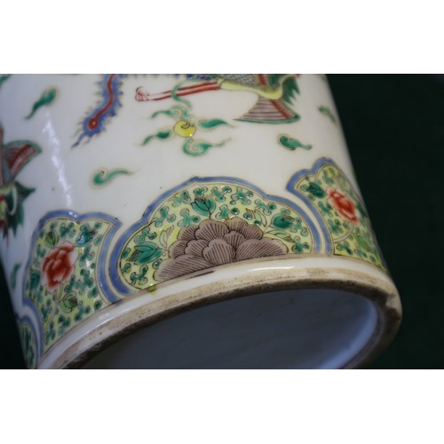 35 - A Chinese famille vert vase with flared rim and tapering body, decorated phoenix and clouds, on hard... 