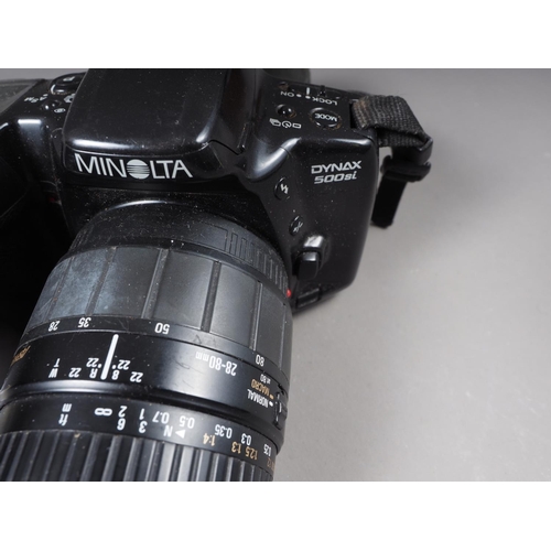 164 - A Minolta Dynax 500SI SLR, five other Minolta Dynax cameras and accessories, and other cameras and p... 