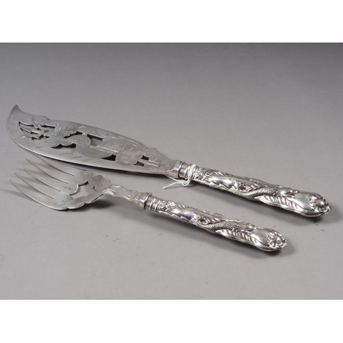 352 - A cased set of six silver handled butter knives, four pairs of silver handled fish eaters and a pair... 