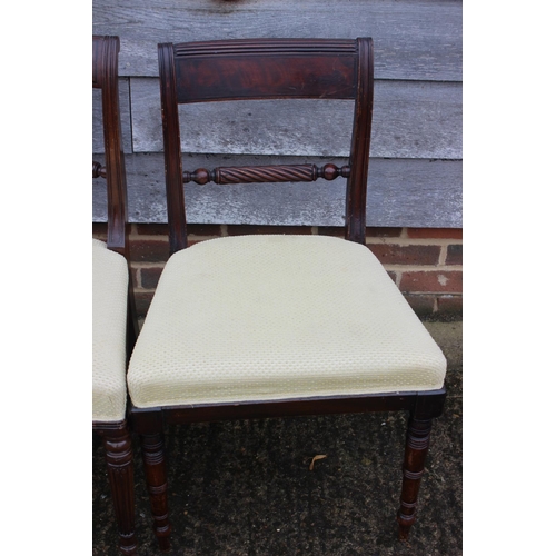 487 - A Harlequin set of six rope twist bar back dining chairs with stuffed over seats, on turned supports... 