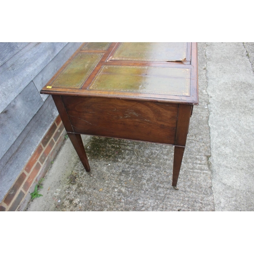 518 - A late 19th century mahogany writing desk, with tooled leather adjustable writing surface, over two ... 