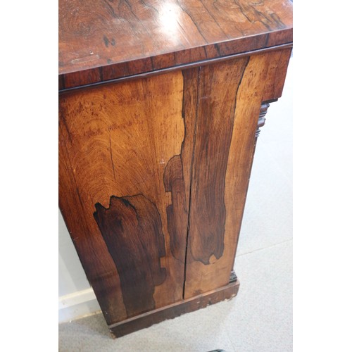 523 - A Regency rosewood chiffonier, fitted frieze drawer over two brass lattice panel doors, on block bas... 