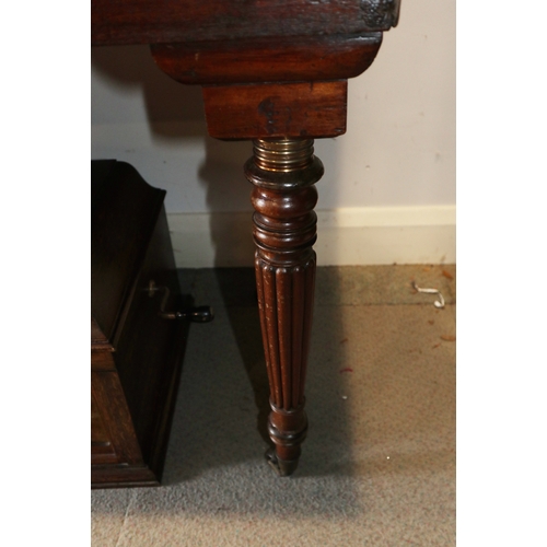 524 - An early 19th century mahogany box and ebony strung square piano case, on reeded castored supports, ... 