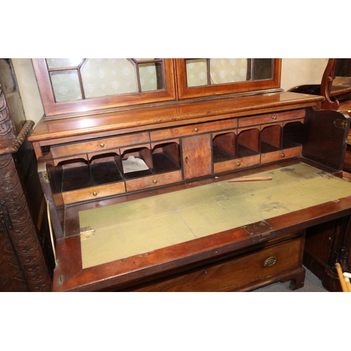 526 - A Georgian mahogany satinwood box and ebony strung secretaire bookcase, the upper section enclosed a... 