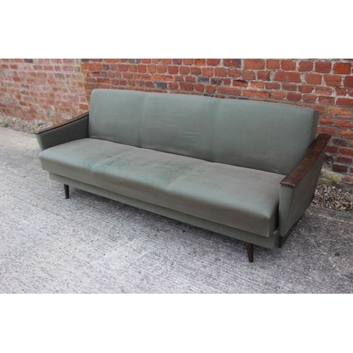 575 - A mid century Scandinavian polished as walnut showframe bed settee, on splay supports (retaining ori... 