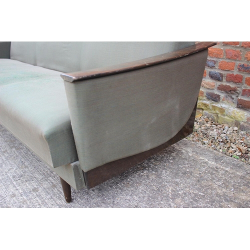 575 - A mid century Scandinavian polished as walnut showframe bed settee, on splay supports (retaining ori... 