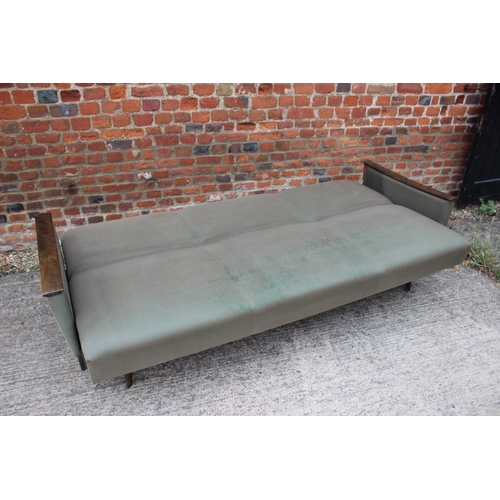 575 - A mid century Scandinavian polished as walnut showframe bed settee, on splay supports (retaining ori... 