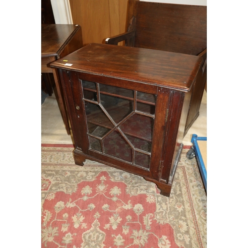 645 - A mahogany side cabinet enclosed lattice glazed door, on bracket feet, 28