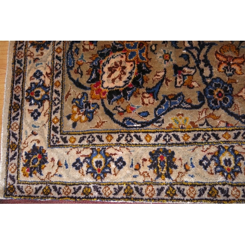 675 - A Kashan silk rug with all-over foliate scroll design and multi boarders in shades of blue, cream, r... 