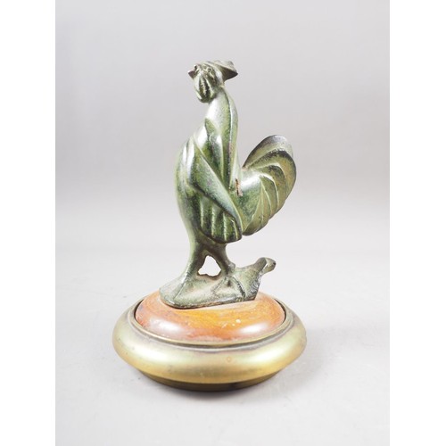 182 - A bronze model of a hen and chicks, on a green marble base, 5